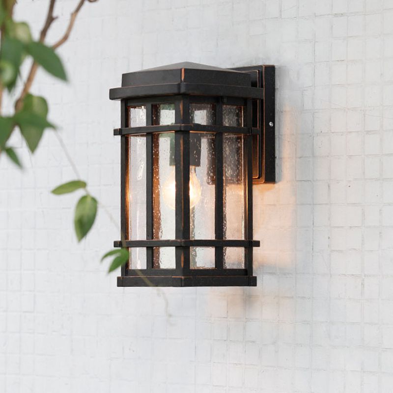 Lámpara de pared rectangular de vidrio transparente Seedy de granja con 1 bombilla negra y marco de metal