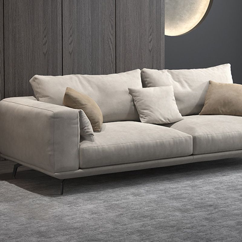 Contemporary Faux Leather Pillows Back Sofa with Tuxedo Arm in Beige