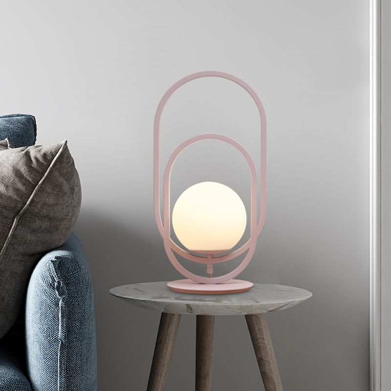 Lámpara de mesa de vidrio blanco global modernista 1 luz de lectura rosa con decoración oblonga doble