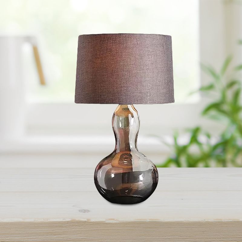 1 tambour de tambour clair table de chevet clair campagne de nuit en tissu marron avec base de gourde en verre fumé
