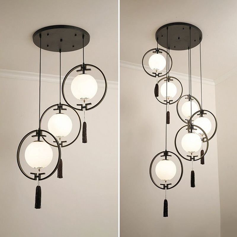 Black Cluster Globe Posting Light Chinoiserie Moderna lámpara de suspensión de vidrio blanco con anillo de borla