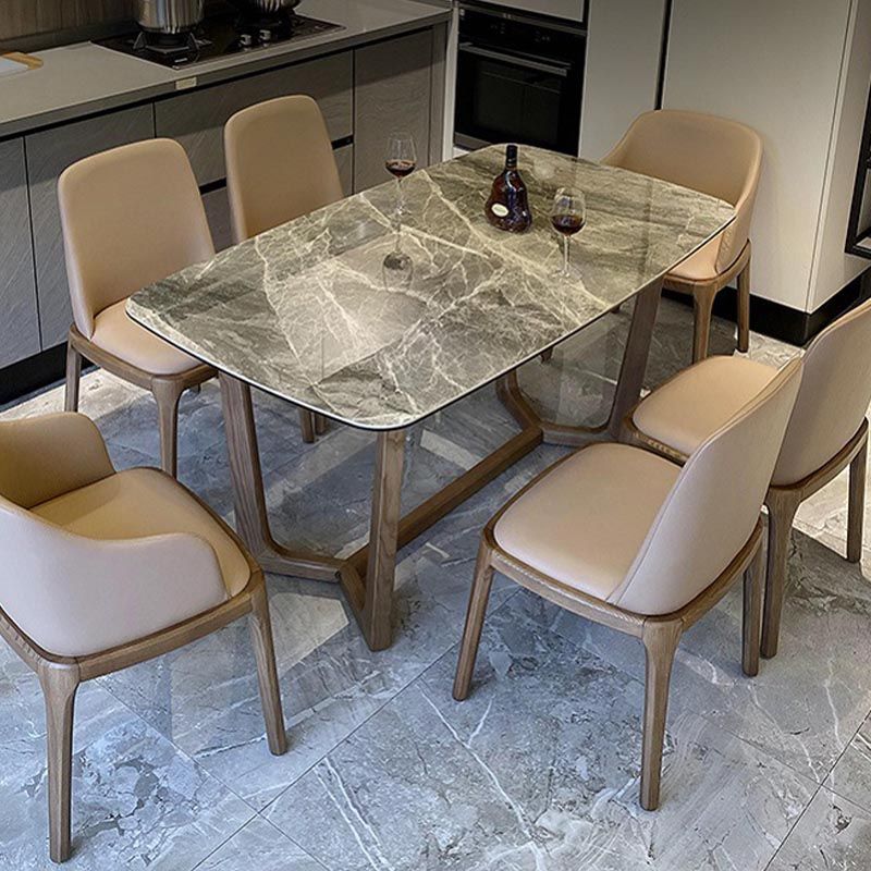 Mesa de comedor de piedra gris con mesa de comedor contemporánea con base de trineo