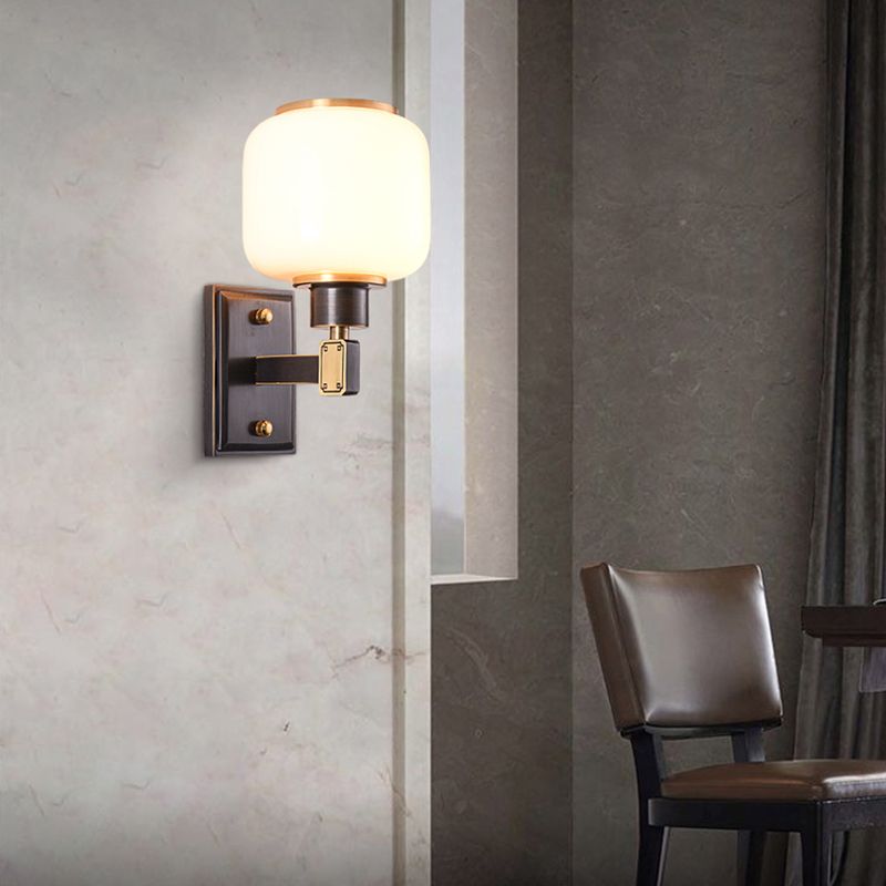 Modern Metal Wall Sconce Lantern Shape Wall Light with Glass Shade for Bedroom