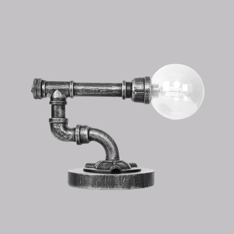 Lampada da lettura a luce singola in argento antico/bronzo. Illuminazione industriale con paralume globo in vetro trasparente/ambrato
