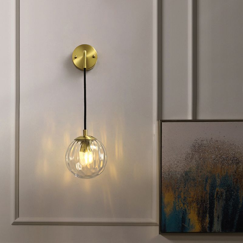 Clear Ripple Glass Ball Wall Light Minimalistic 1-Light Brass Sconce Fixture for Dining Room