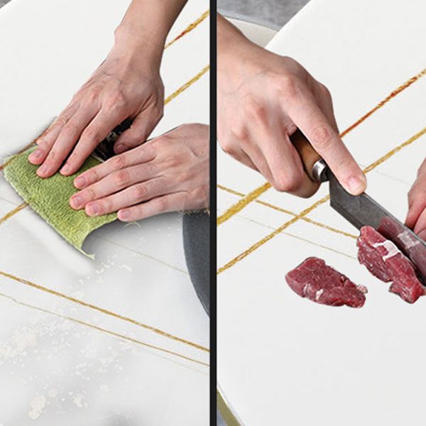 Tavolo da pranzo rotondo contemporaneo in metallo tavolo in pietra sinterizzata con base piedistallo