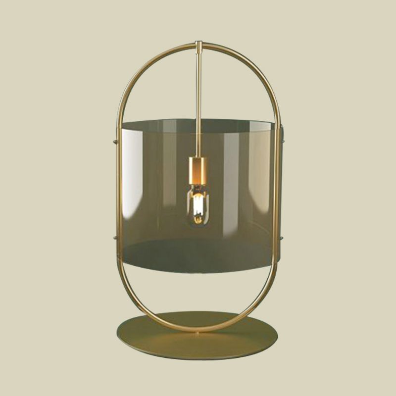 Lampada da comodino in vetro marrone chiaro a 1 testa con illuminazione da scrivania a cilindro dorato e anello ovale