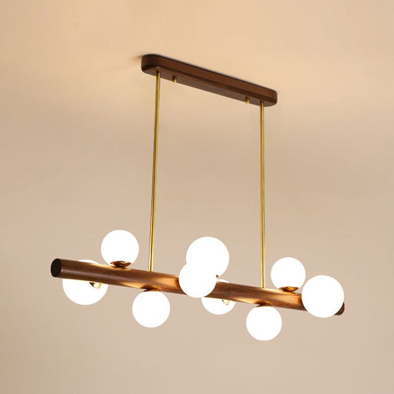 Luces colgantes de restaurantes de múltiples cabezas de madera moderna con sombra de vidrio de globo