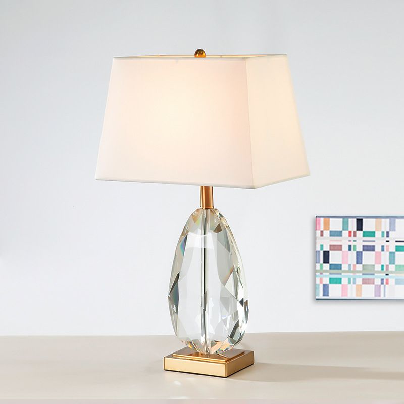 1 Glühbirnenschlafzimmertisch Licht moderner beige Nachttischlampe mit Trapezstoffschatten