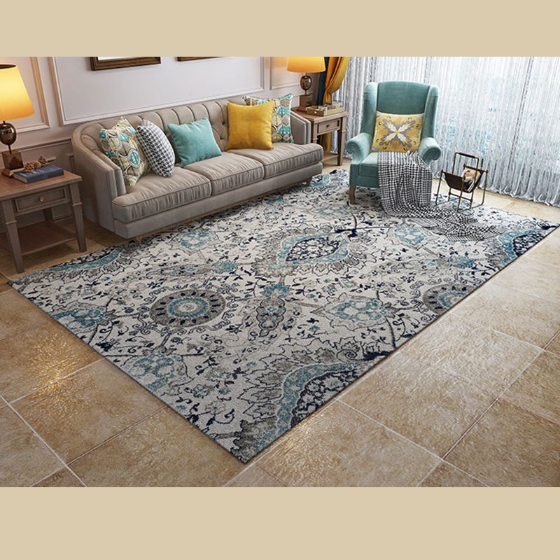 Tapis à imprimé floral de couleur unie