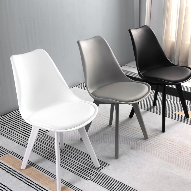 Minimalistischer Stil Plastik Ess -Armless Stuhl Polsterte feste Rückenstühle für Zuhause gepolstert
