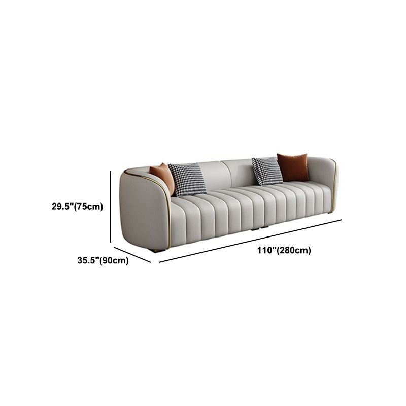 Genuine Leather Sloped Arm Sofa Modern Beige Sofa with Pillows