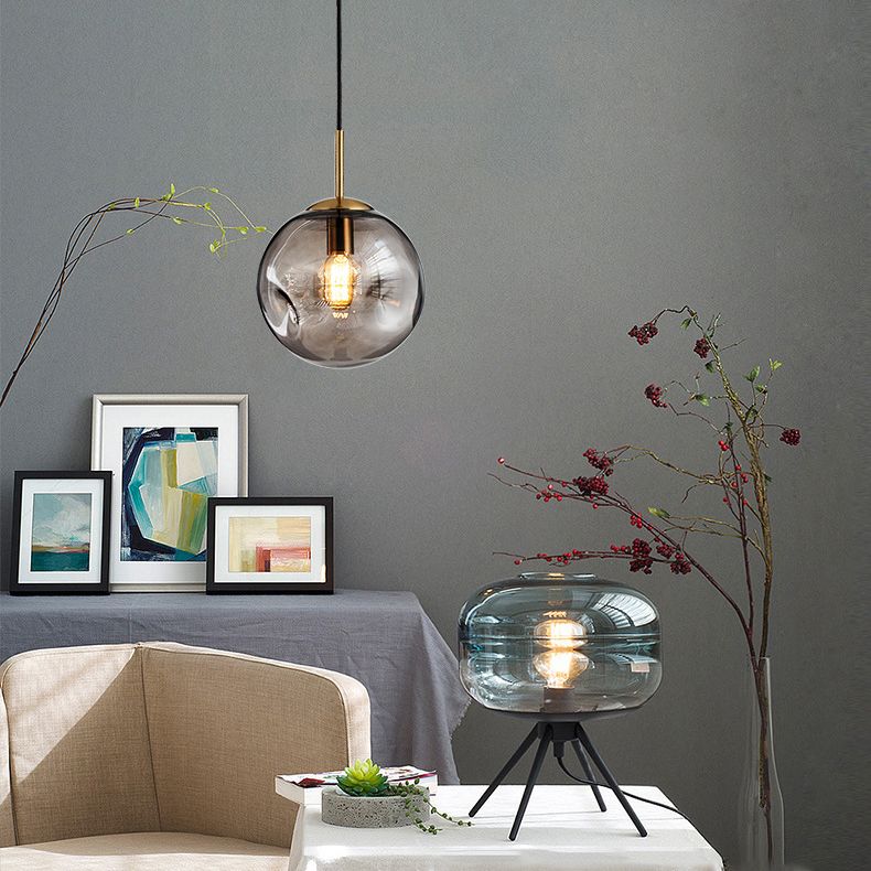 Moderne künstlerische Innenhängung Hängende Lampe mit Schmiedeeisen -Globus mit Glasschatten