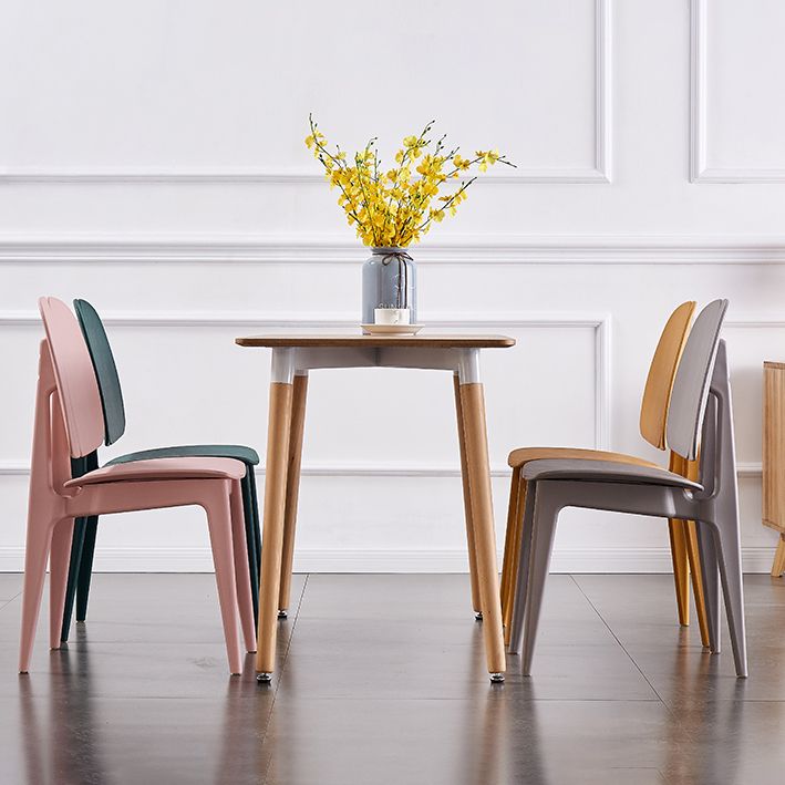 Sillas de comedor y decorativas contemporáneas Silla lateral de plástico con respaldo abierto para interiores y exteriores