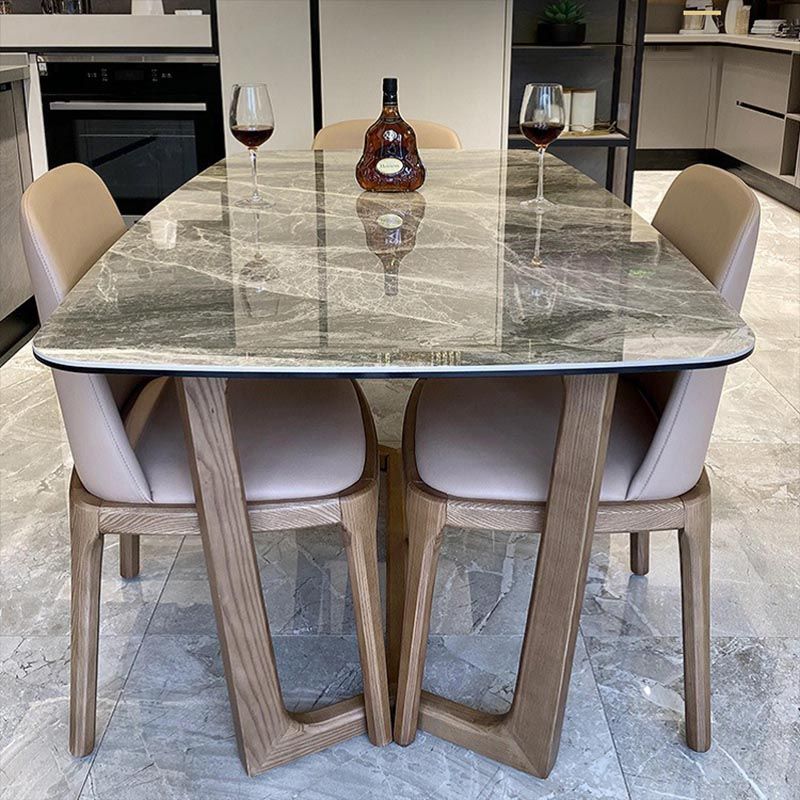 Mesa de comedor de piedra gris con mesa de comedor contemporánea con base de trineo