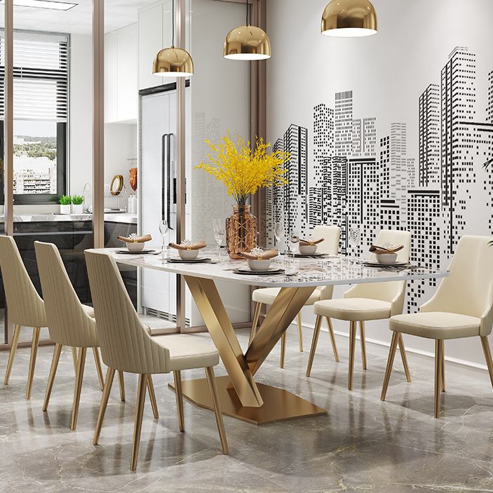 Mesa de comedor rectangular de lujo tradicional de metal, mesa superior de piedra sinterizada con base de pedestal