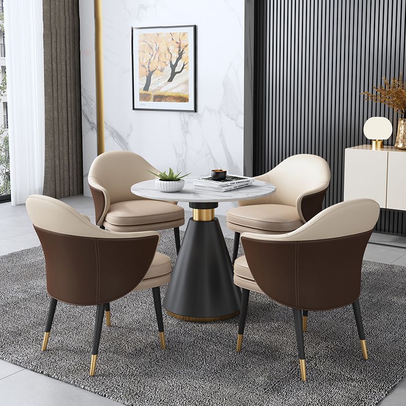 Eigentijdse stenen eettafel rond voetstuk huis keuken dinermeubilair