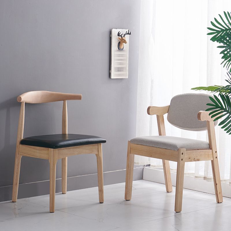 Silla lateral escandinava interior tapizada Silla de comedor de madera con respaldo abierto