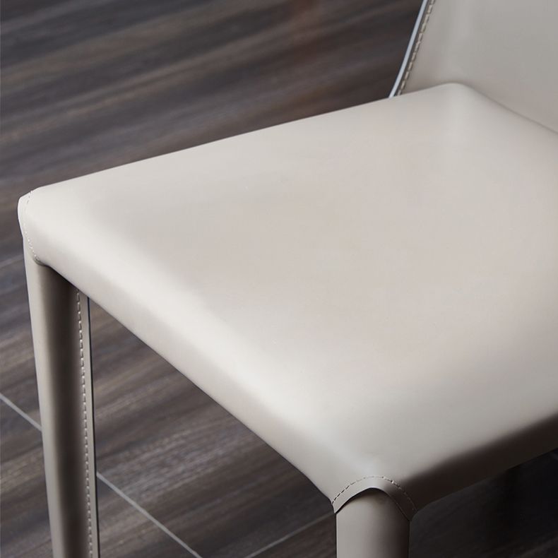 Silla auxiliar de comedor contemporánea Silla de respaldo sólido sin brazos Brasserie de cuero