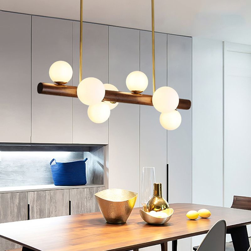 Luces colgantes de restaurantes de múltiples cabezas de madera moderna con sombra de vidrio de globo
