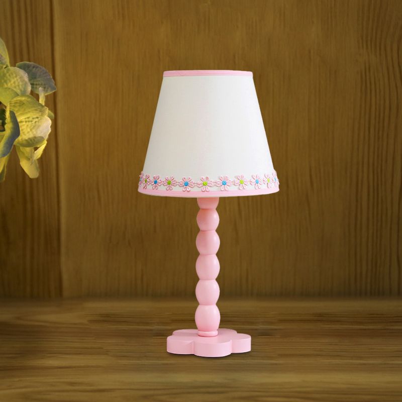 Iluminación de lectura de barril blanco y rosa con patrón de flores contemporáneo 1 lámpara de mesa nocturna de madera clara