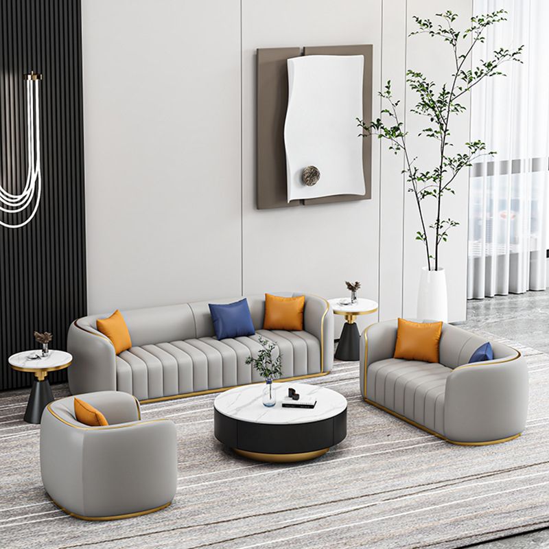Tuxedo Arm Sofa in Grey/Blue Faux Leather Sofa with Metal Accent