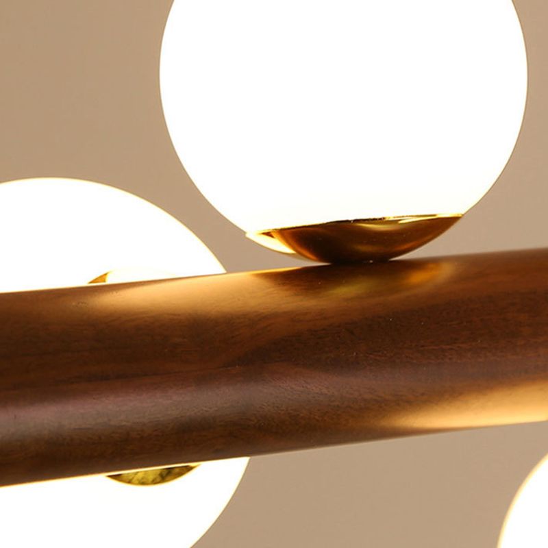 Luces colgantes de restaurantes de múltiples cabezas de madera moderna con sombra de vidrio de globo