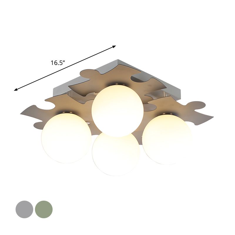 Globe di vetro bianco semi-filo modernista Modernist 4-bulb Luce a filo con decorazione puzzle in grigio/verde