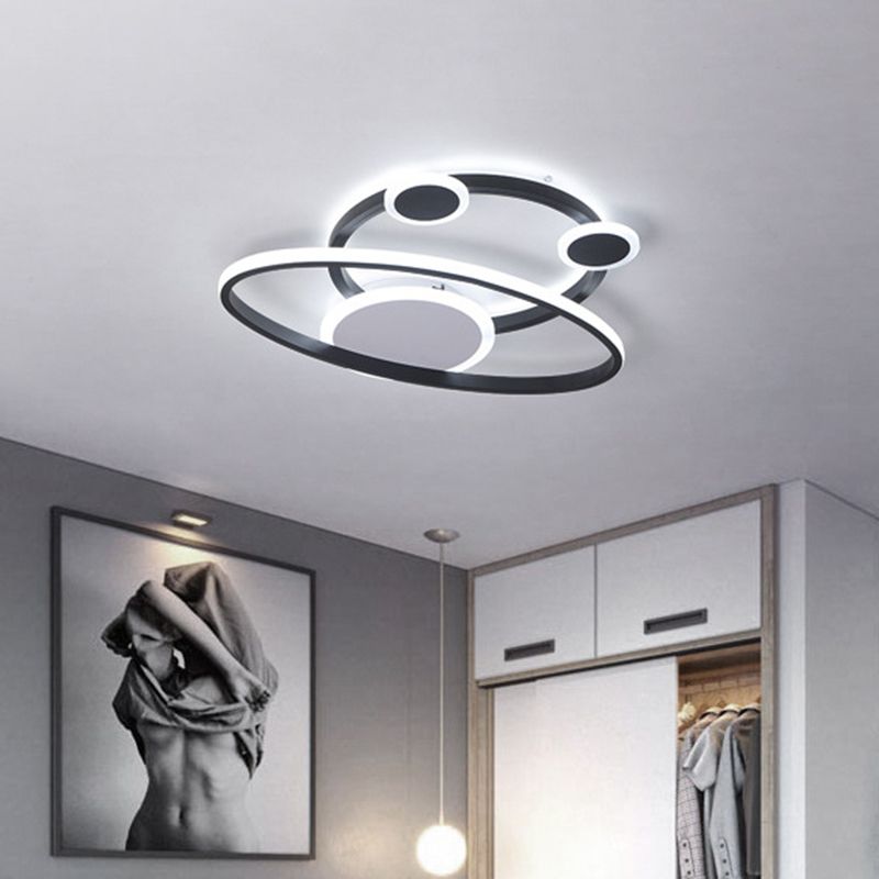 Minimalist LED Flush Mount Lamp Black Planet Ceiling Light Fixture with Acrylic Shade for Living Room in Warm/White Light