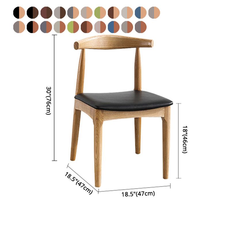 Silla lateral escandinava con respaldo abierto Silla de comedor tapizada con acabado mate