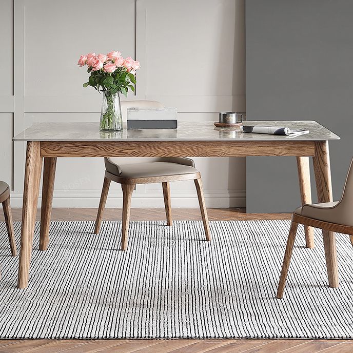 Mesa rectangular con tapa de piedra sinterizada en mesa de cocina gris con base de madera y 4 patas