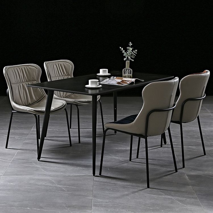 El comedor moderno del metal preside sillas sin brazos tapizadas del cuero lateral de la PU