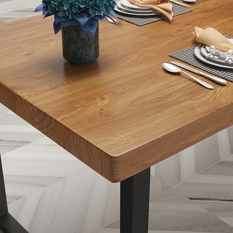 Table à manger en bois massif de style industriel