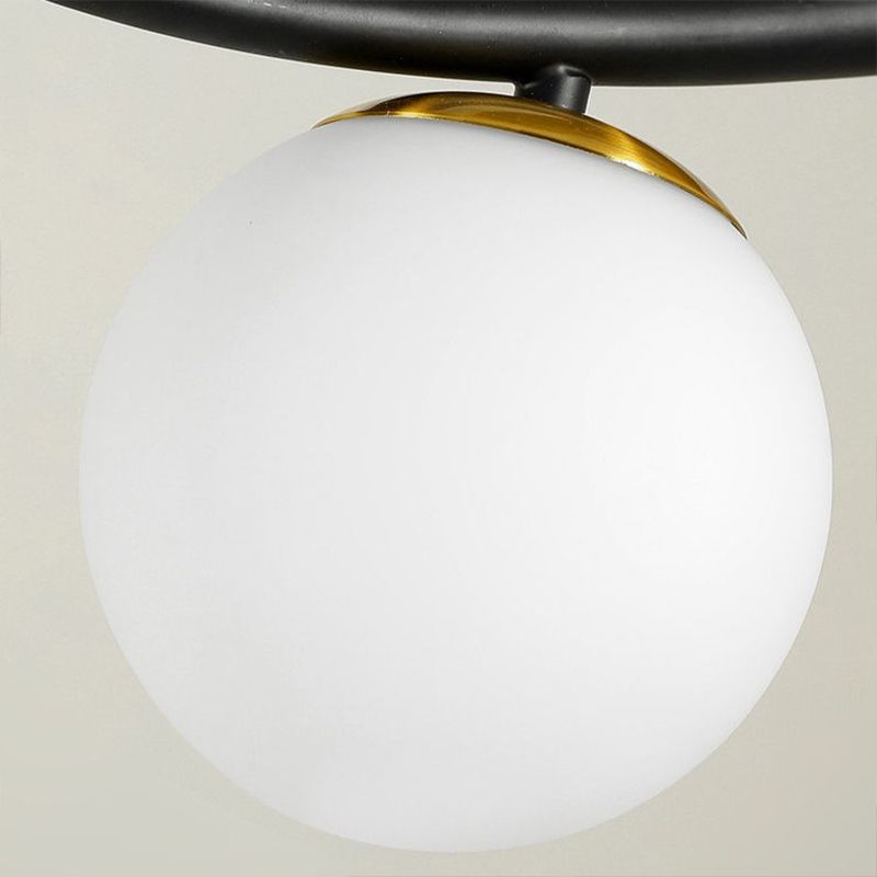 Glass Globe Island Light in Modern Singularity Wrought Iron Pendant Light with Resin Bird Decoration