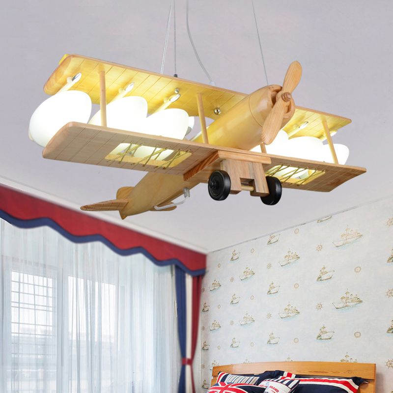 Nordic Style Beige Pendant Light Glider Shaped Wood Hanging Light for Kindergarten