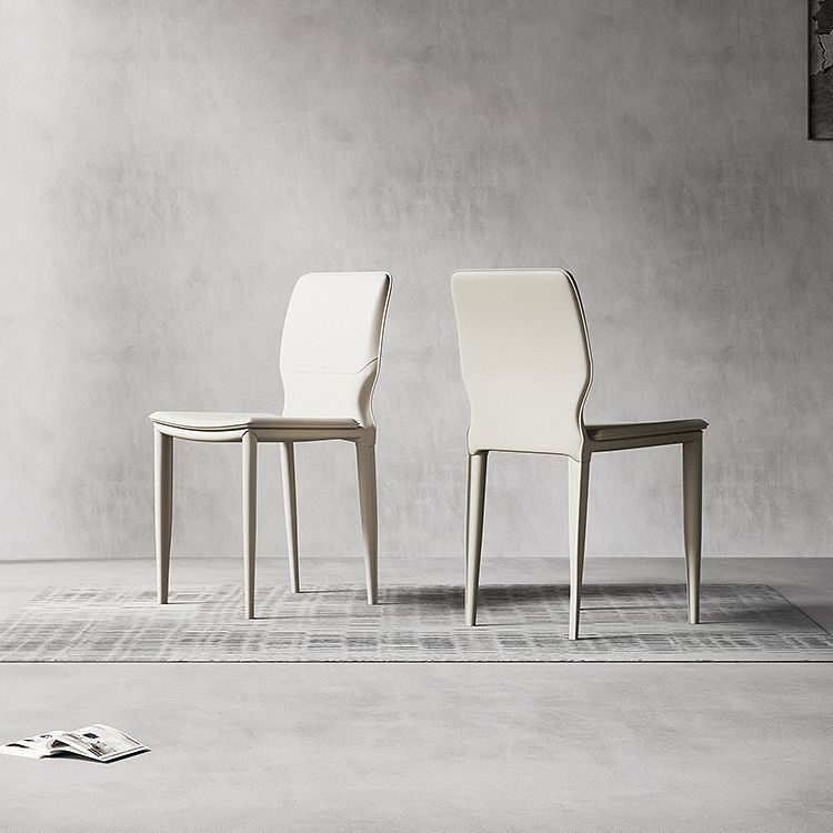 Sillas laterales contemporáneas sin brazos con respaldo sólido Sillas de comedor de cuero