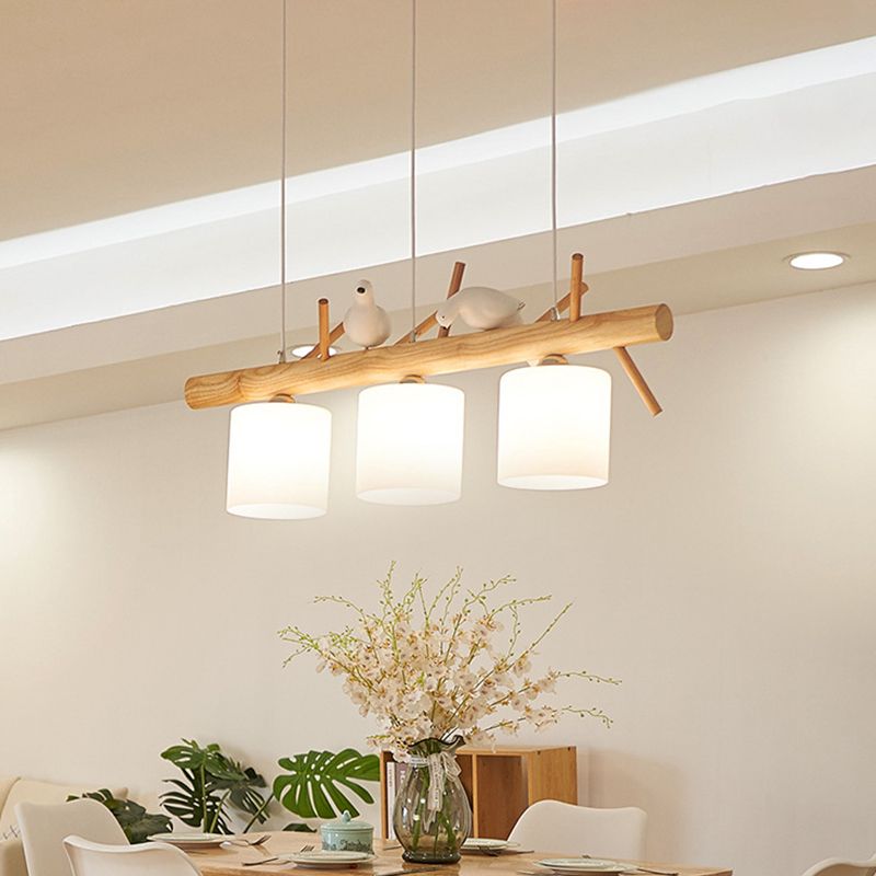 Beige Drum Island Lighting Ideas Simple 2/3 Heads Opaque Glass Pendant Lamp with Bird on Wood Branch Beam Design