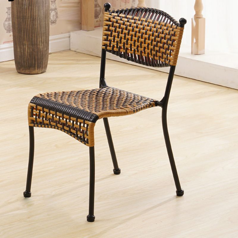 Tropical Dining Side Chair in Brown/Black Plastic with Open Back