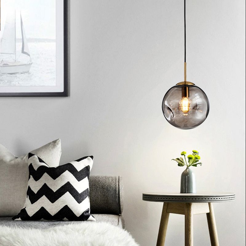 Moderne künstlerische Innenhängung Hängende Lampe mit Schmiedeeisen -Globus mit Glasschatten