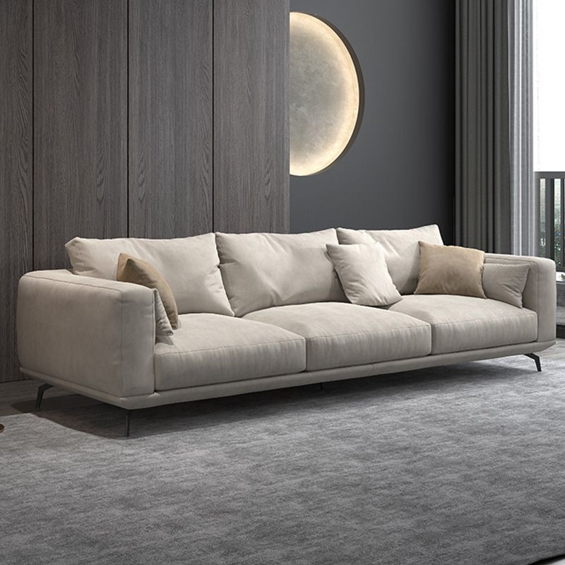 Contemporary Faux Leather Pillows Back Sofa with Tuxedo Arm in Beige