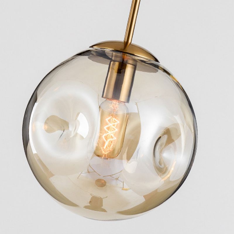 Globe Glass Hanging Lamp in Modern Artistic Style Electroplate Metal Pendant Light for Dining Room