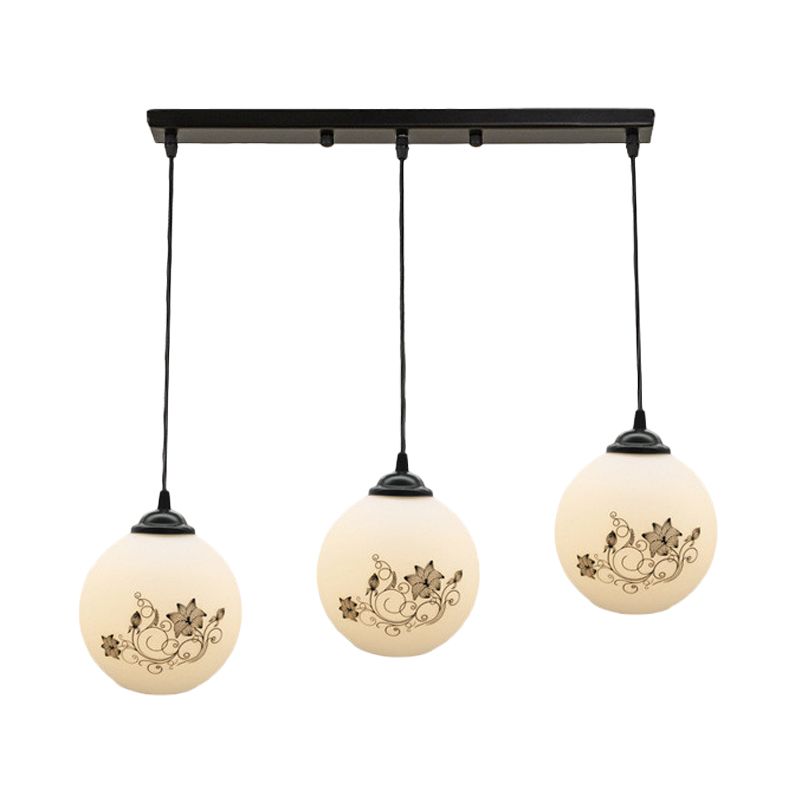 Black Sphere Multi Ceiling Lamp Modernism White Printing Glass 3-Light Dining Room Pendant with Round/Linear Canopy