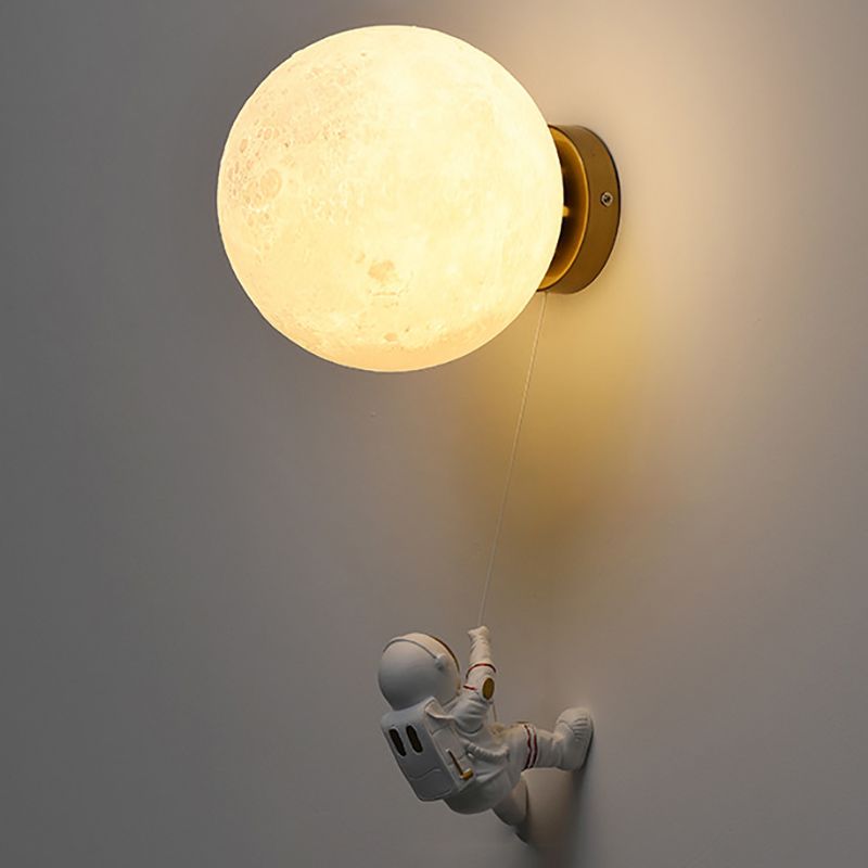 Lampada da parete astronauta e piante