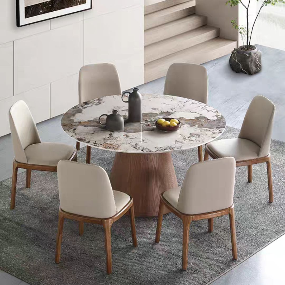 Set da tavolo in pietra sinterizzato scandinavo di 5/7 con set da pranzo a tavola rotonda con sedie in pelle