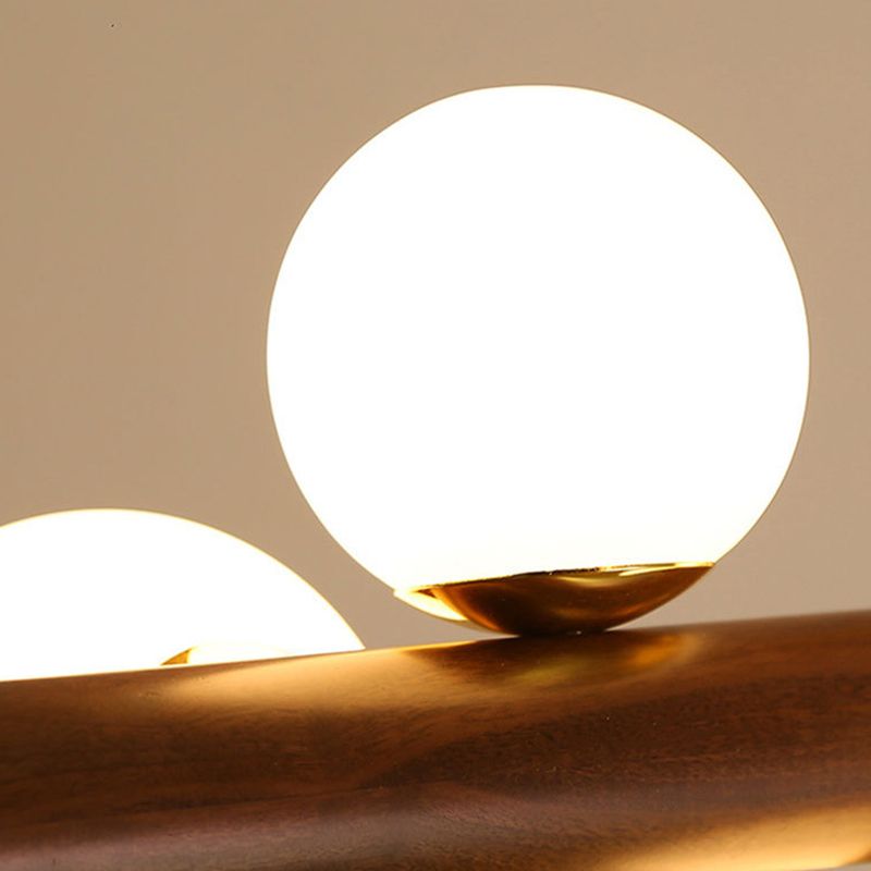 Luces colgantes de restaurantes de múltiples cabezas de madera moderna con sombra de vidrio de globo