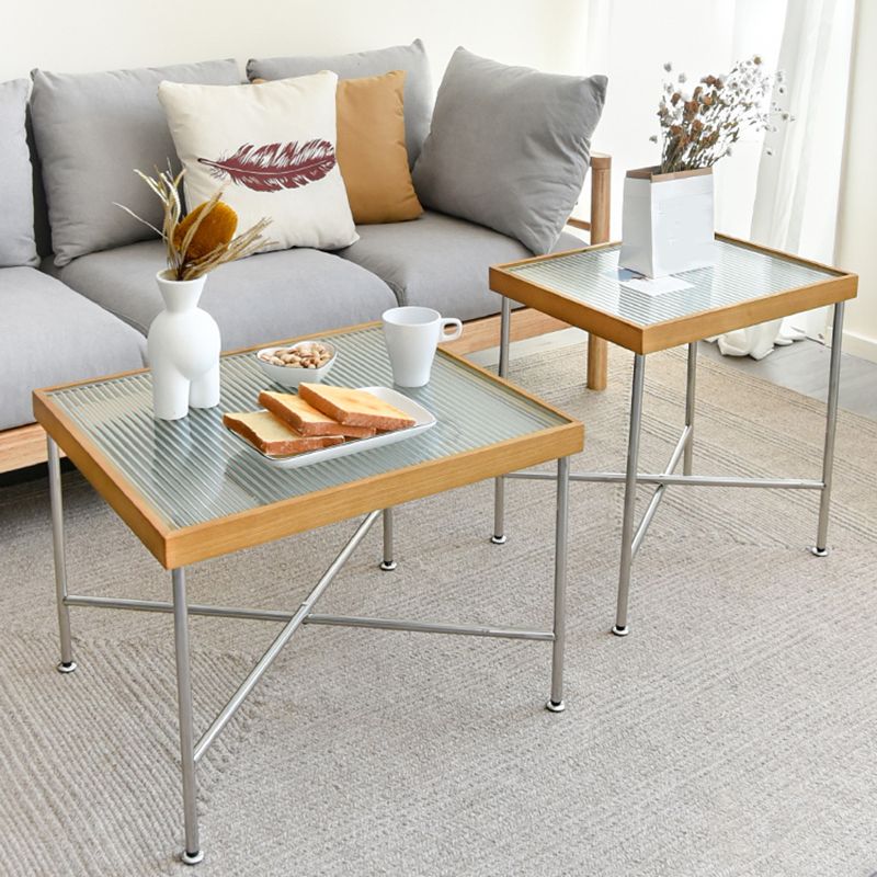 Scandinavian Glass Coffee Table with Wood Accents Cross Legs Cocktail Table
