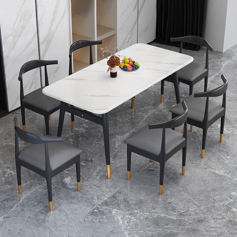 Juego de comedor de comedor de piedra sinterizada rectangular escandinavo con 4 patas base