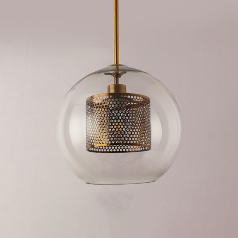 Éclairage de pendentif rond unique contemporain avec une teinte en verre transparent