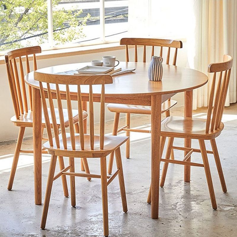 Round Dining Table Modern 4 Legs Wood Color Fixed Table of Solid Wood