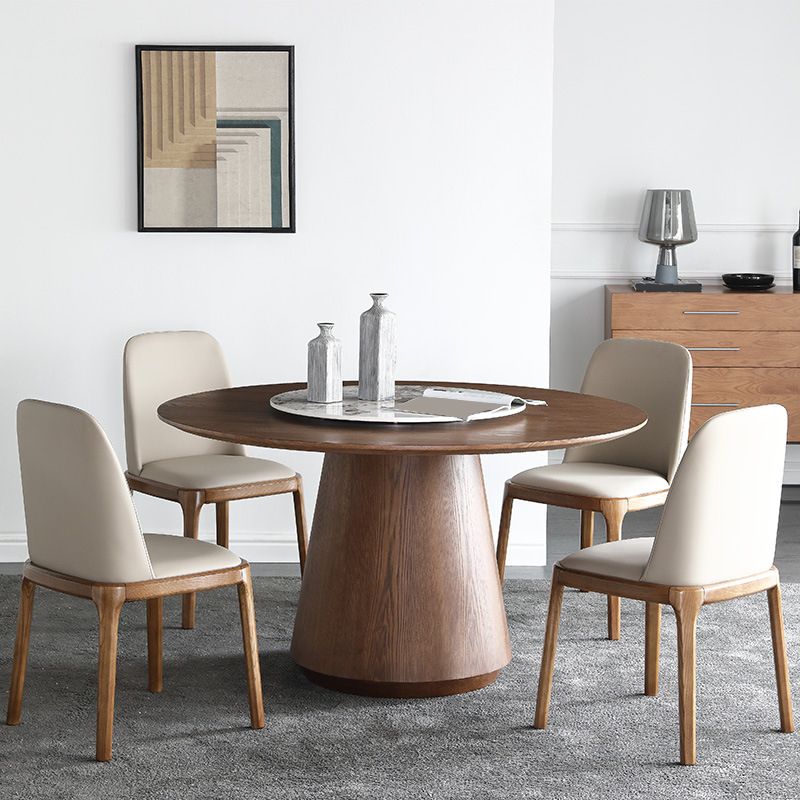Pedestal Base Is Designed for a Round Coffee Table Made of Walnut Wood
